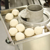 Finished dough balls made by the Roundi Dough Rounder.