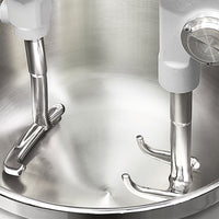 An image showing the twin arms inside the dough mixing bowl.